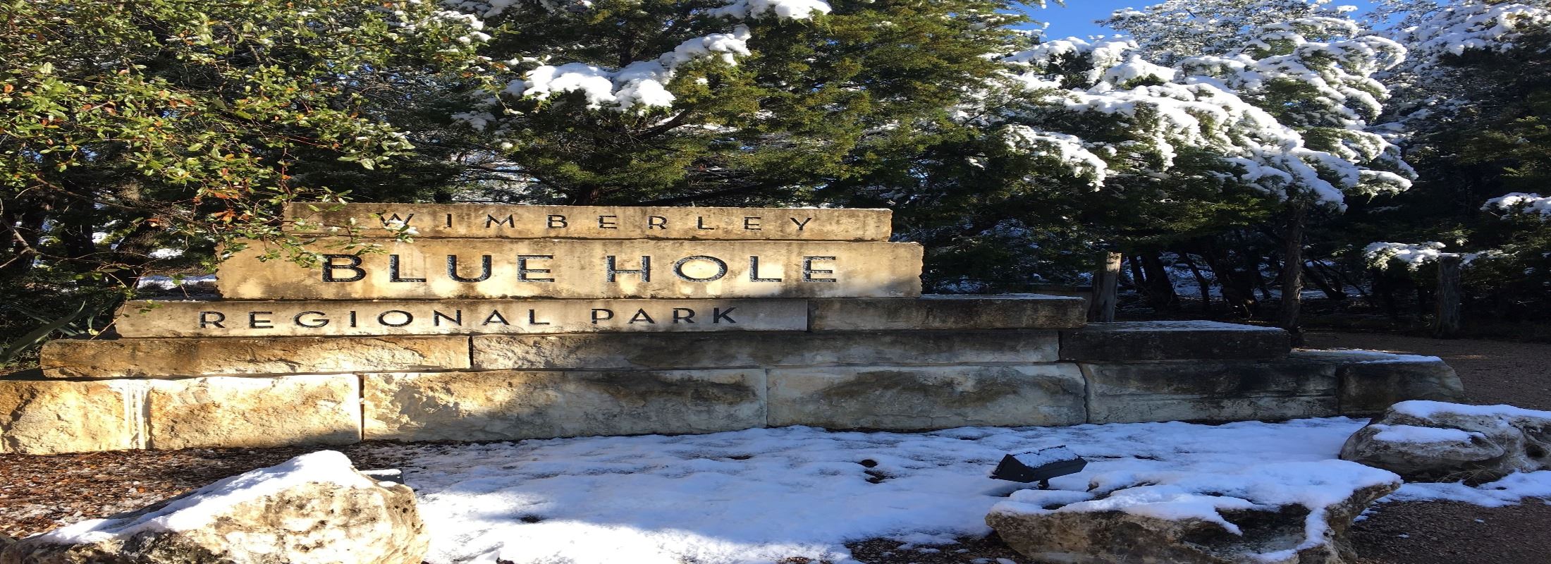 Snow on Blue Hole Sign
